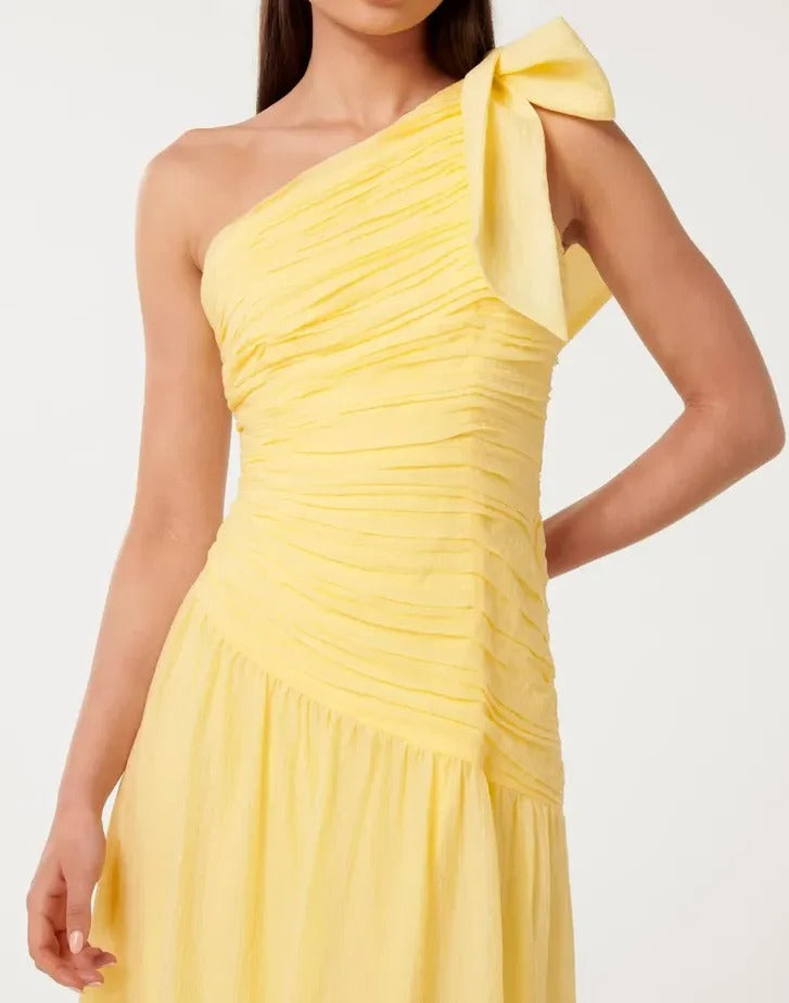 Light yellow one-shoulder maxi dress with draped bodice