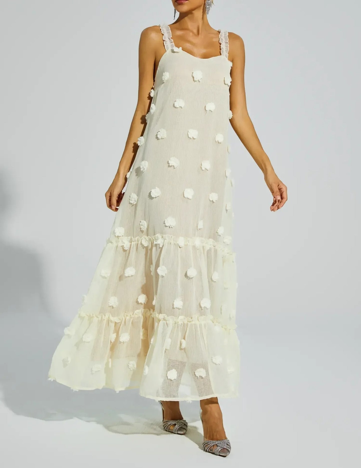 Cream sleeveless midi dress with textured dot pattern