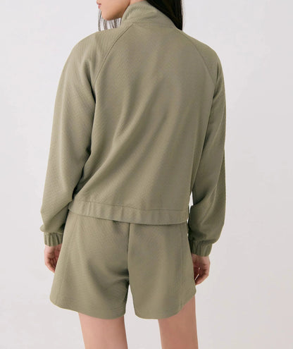 Light green half-zip sweater and shorts set