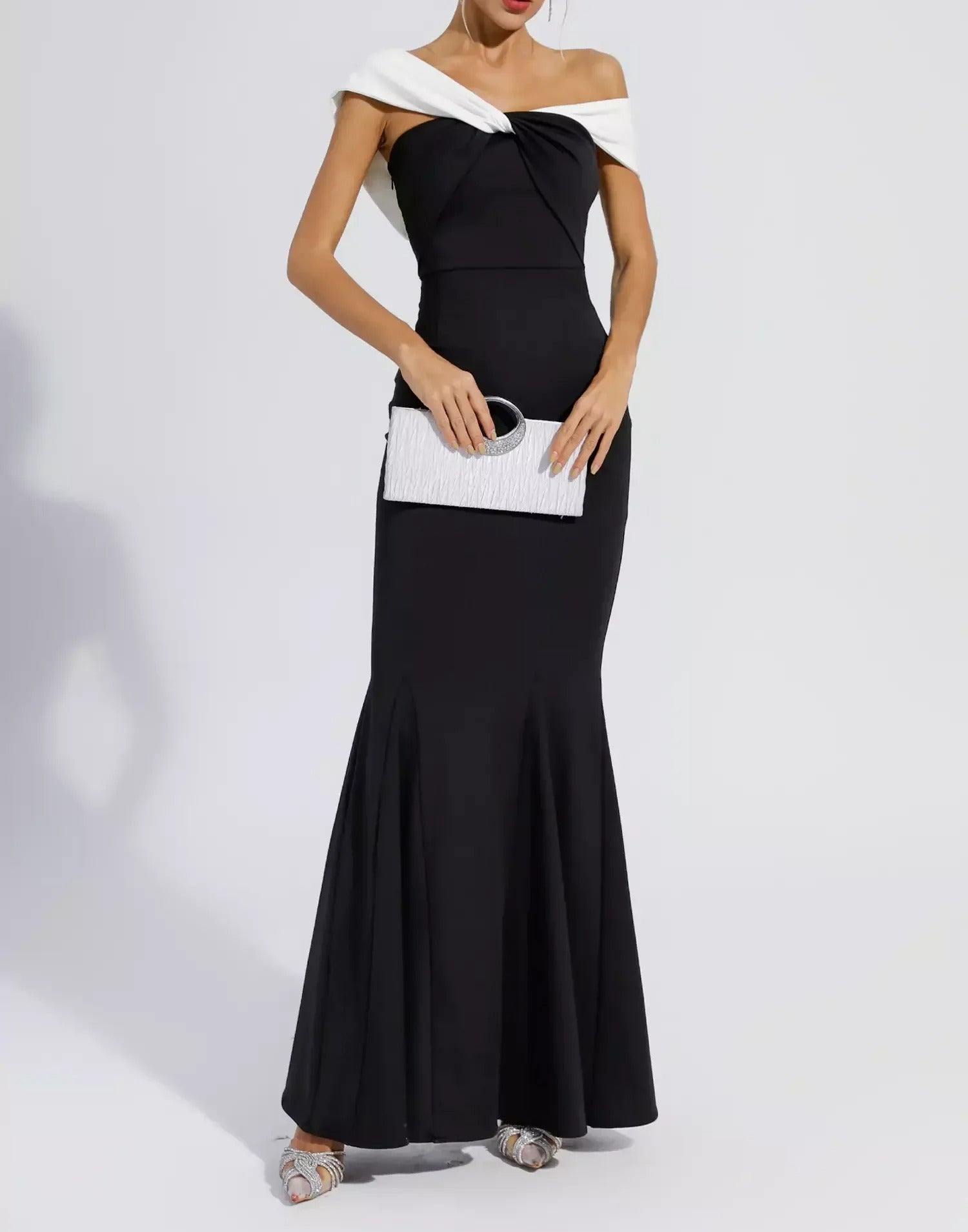 Black off-shoulder maxi dress with contrast draped neckline