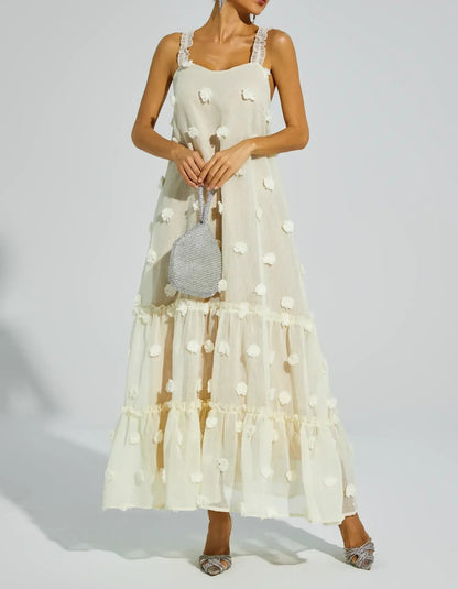 Cream sleeveless midi dress with textured dot pattern