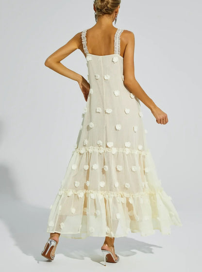 Cream sleeveless midi dress with textured dot pattern